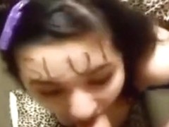 girl with 'slut' written on her forehead sucks cock and spits out the cum
