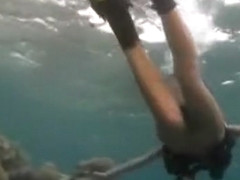 Naked SCUBA dive