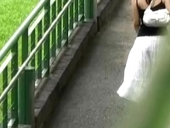 Asian babe in a long white skirt gets street sharked.