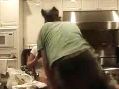 Brunette sucks and doggystyle fucks her bf in the kitchen