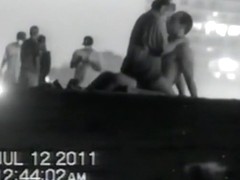 Voyeur tapes a couple having sex at the  beach