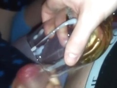Spraying down a glass of grape juice to have a fun. Notes of recent cum :p