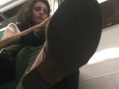 Gorgeous Mature Lady In Sandals Spotted By A Voyeur Camera In The Subway