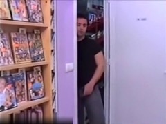 Pretty latin brunette milf make sex fun with a young dude in a videos store