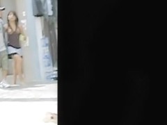 Hot upskirts of the walking in the street babe