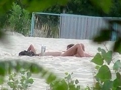 Voyeur tapes 2 nudist couples having sex at the beach