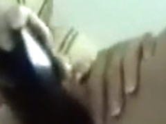 fucks herself with a hair brush