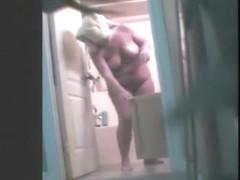 Chubby amateur gets clean in voyeur shower video