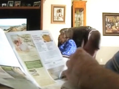 Jerking off behind his morning paper