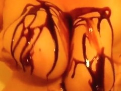 Large milk shakes overspread in chocolate syrup
