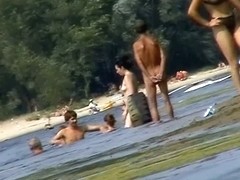 Hot mature women filmed by a voyeur on the nudist beach