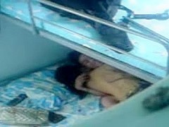 Amateur voyeur video of an Asian couple having sex