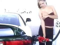 Pretty lady exposes her boobies at the gas station