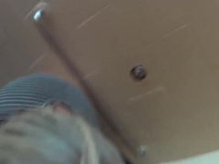 MILF fucks in public bathroom stall