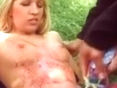 Blonde hoe is on the field while many