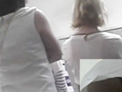 Brunette amateur in the principal role in upskirt porn