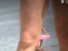 Beach nudist girls show asses and tits to the beach crowd