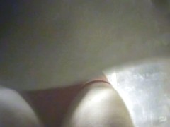 Milfs demonstrate their tits and thighs to a hidden cam in the girls dressing room