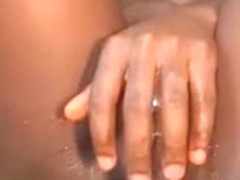 Ebony girl squirts and licks her own juice