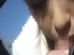 Asian Milf Is Giving Head In Her Car