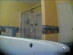 Voyeur clip shows a immature in bathroom