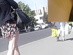 Skinny brunette participates in upskirt porno