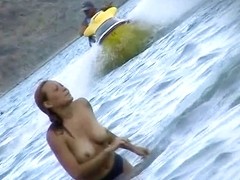 Curvy  babes filmed on a nude beach