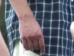 Brown hair model relaxes at the park 2/4