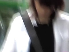 White shirt on and brown skirt sharking while slowly pacing