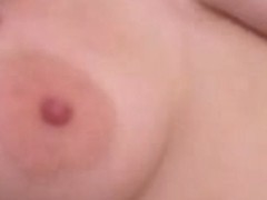 Busty Holly sucking her own tits and masturbates her pussy