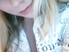 charming blonde plays with h...