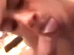 Sexy brunette babe blows stiff cock