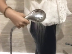 girl wetlook fully clothed bath transparent shirt