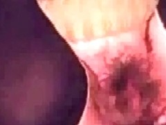 Fingering hairy cunt in stockings