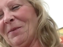 Granny with big tits gets finger fucked by photographer