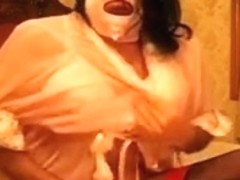 Bawdy and freaky crossdresser in the mask masturbating on web camera
