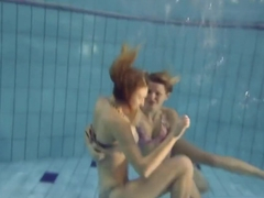 Horny Girls Strip Eachother In The Pool