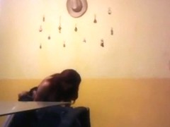 Dude fucks a girl standup doggystyle in the living room