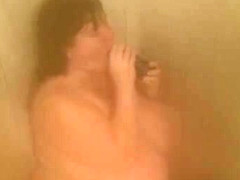 Busty Bbw Lexxxi Sucks Big Black Dildo In Shower