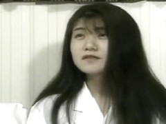 Japanese girl is talked into getting undressed and fingering her snatch