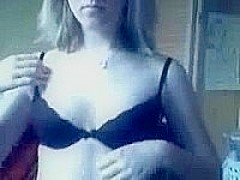 Blonde girl undresses on webcam porno