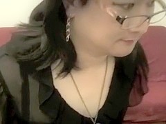 Mature cd with glasses toying her ass