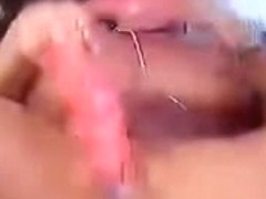 Masturbating with a toy like a sexy brunette amateur