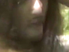 Brunette gets naked flashes in tall grass outdoor