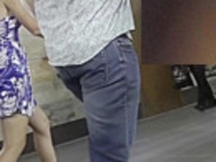 Dark-haired slender girl in the free upskirt video