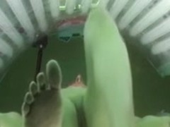 She tans in the study