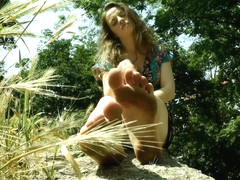 Gorgeous Countryside Girl Playing With Her Dirty Feet In Nature