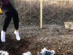 Playing on the Swing with Adidas Superstars and water