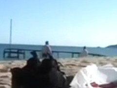 Shameless German couple has torrid sex on the beach
