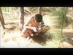 Cute asian lad alone in the forest